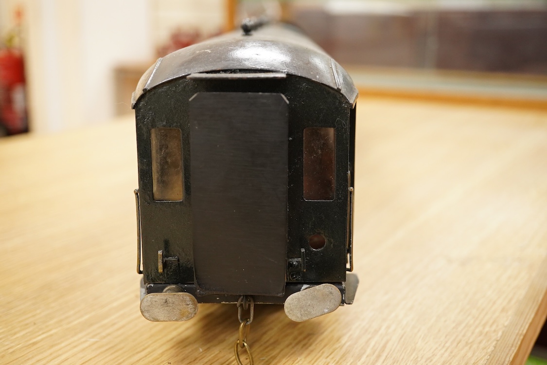 Four Gauge One Continental bogie coaches; two in very dark Green livery, and two ‘Trains Rapides Nord’ in dark green, including some scratch building and possible adaptation from kits